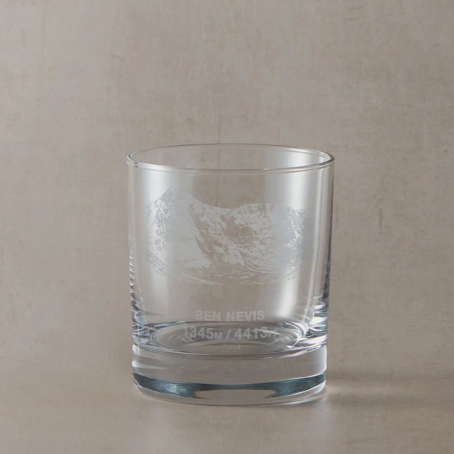 Munro whisky glass engraved with the North East face of Ben Nevis and its height in feet and metres