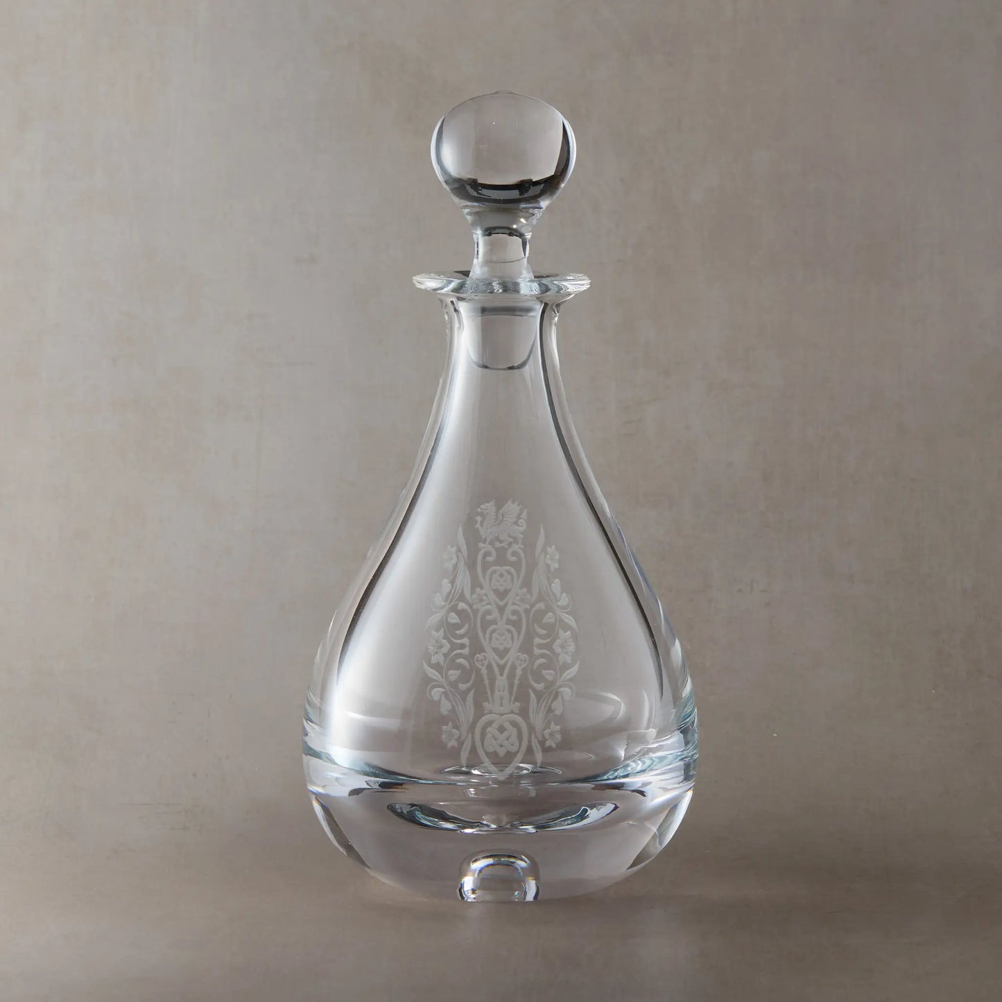 Wine decanter engraved with Welsh dragon, knotwork hearts, crossed keys and daffodil motifs