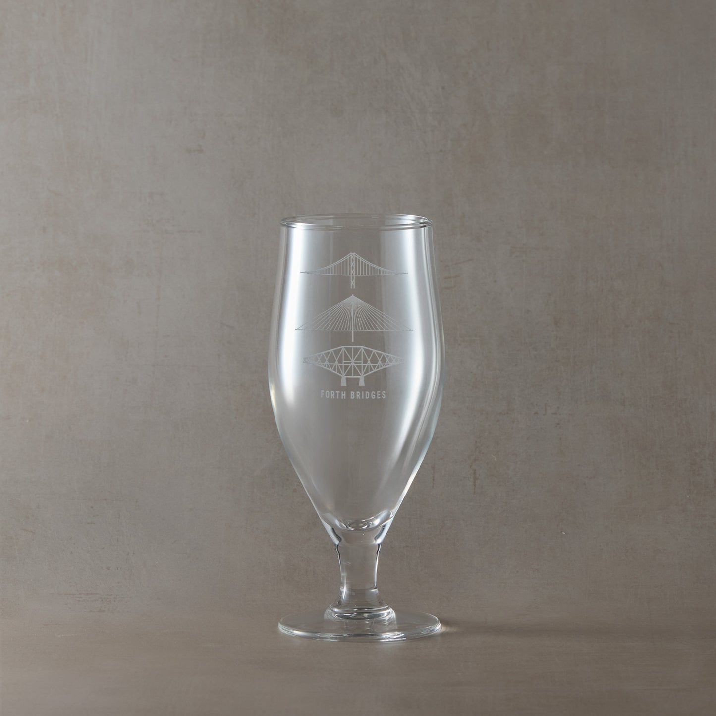 Engraved stemmed beer glass forth rail bridge, forth road bridge, queensferry crossing