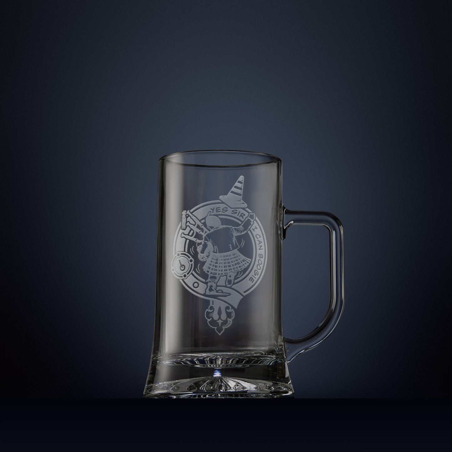 Engraved tankard with dancing Scotsman in a kilt carrying bagpipes and traffic cone surrounded by a clan crest buckle