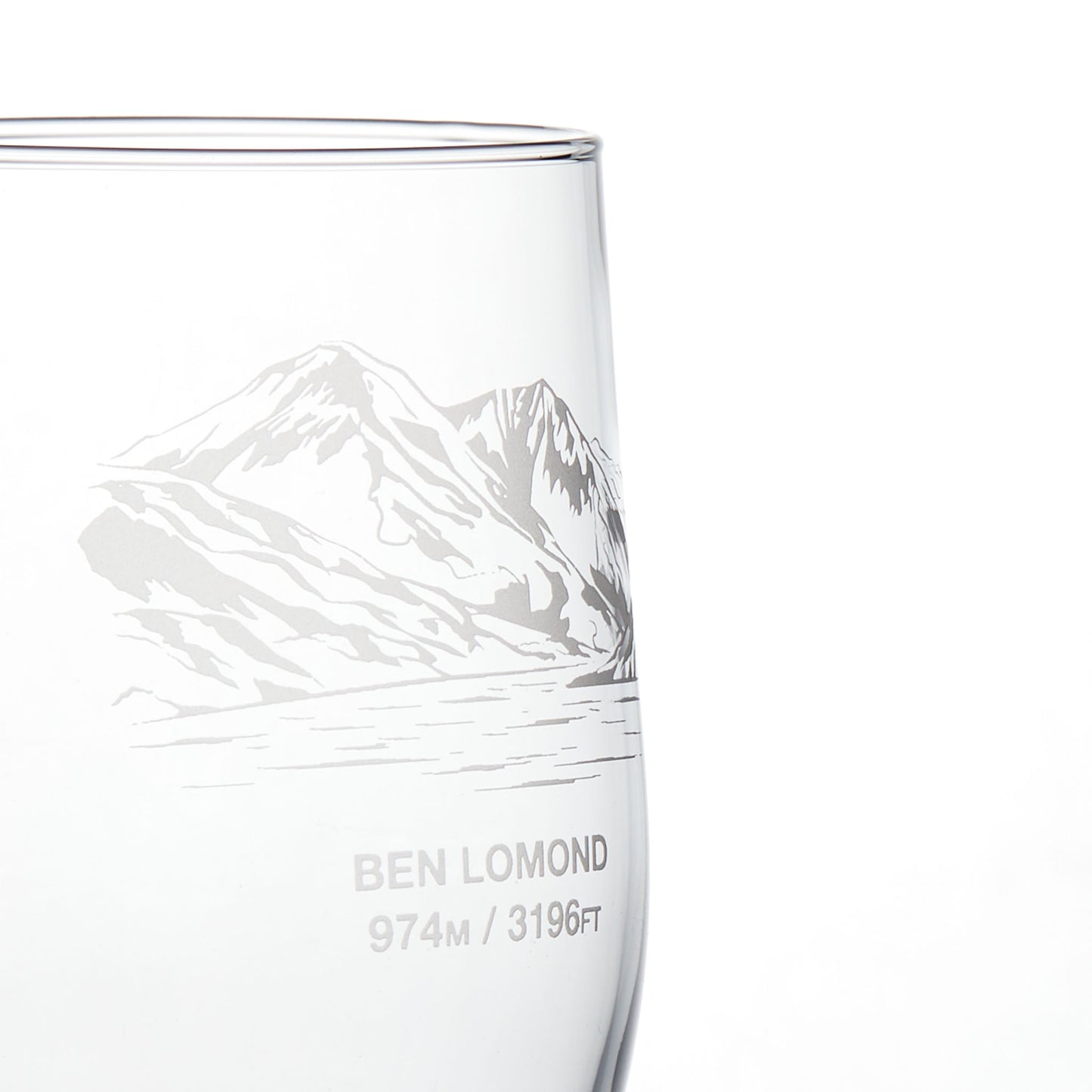 Close-up engraving detail of Ben Lomond stemmed beer glass photographed on a white background