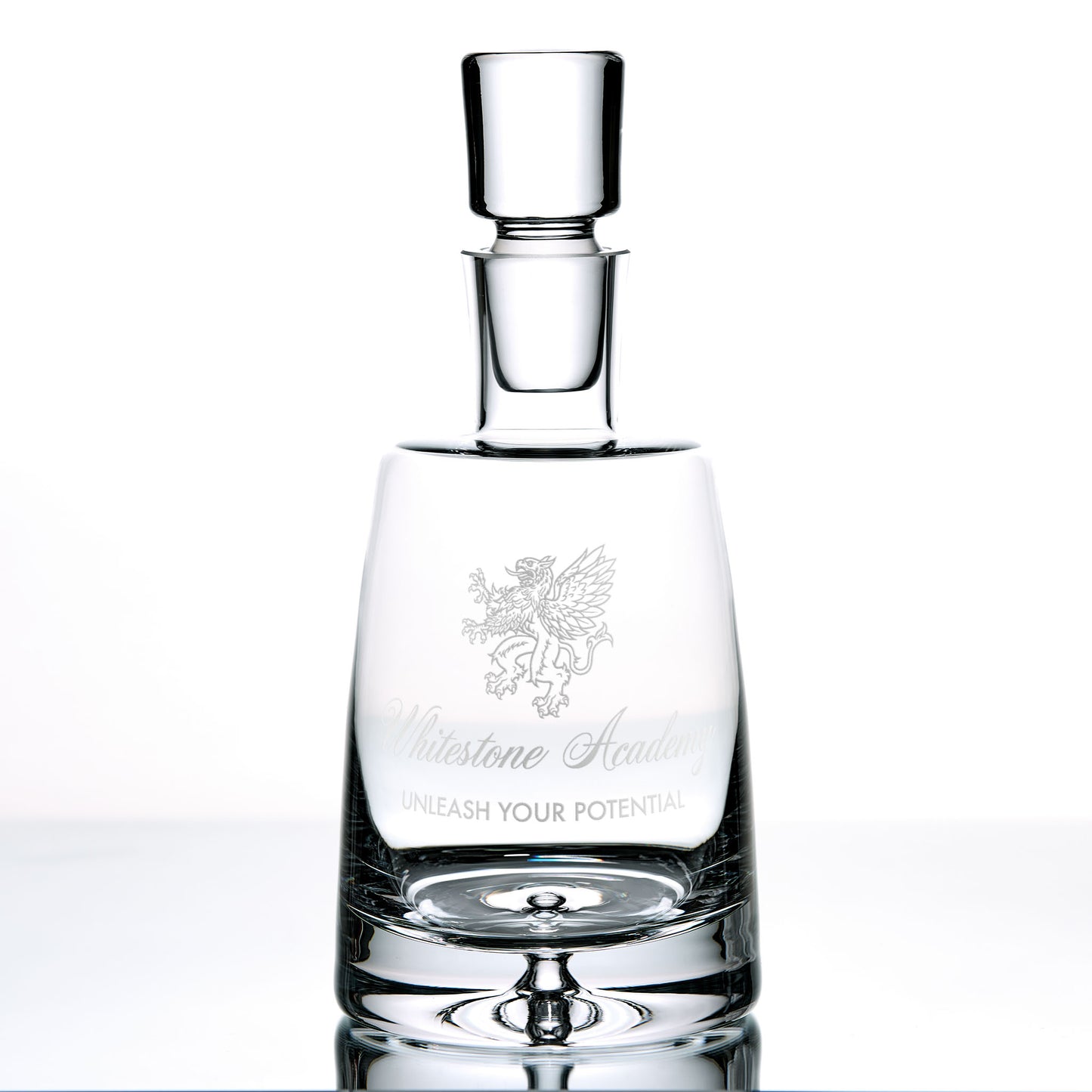 Handmade glass decanter with a corporate logo and a personalised engraved message on a white background