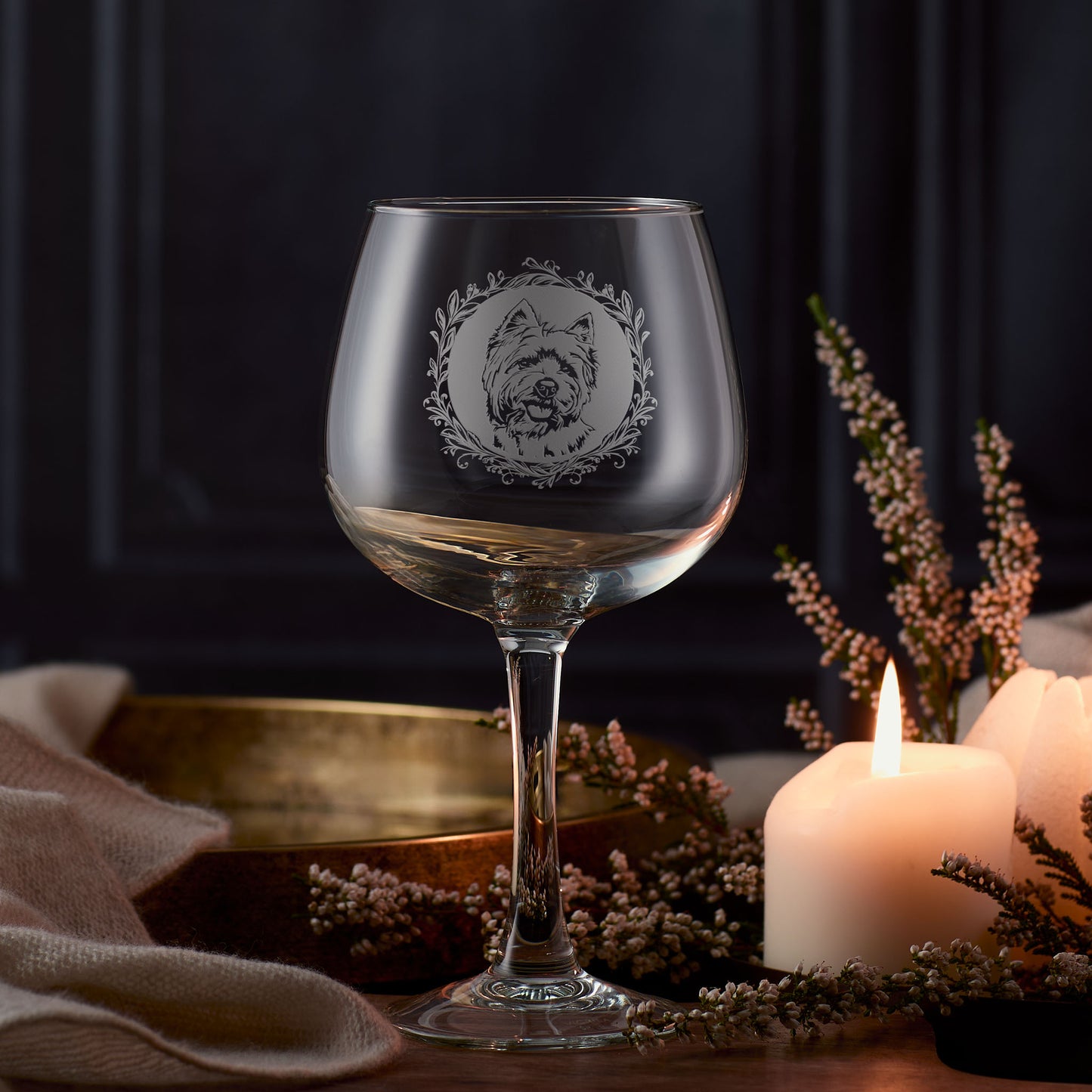 Gin glass with engraved Highland Terrier portrait in circular frame with leafy garland