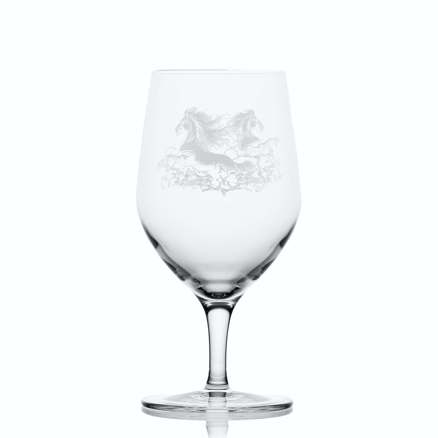 Glass on white background to highlight the shape and form of the glass: Stemmed mineral water glass engraved with Celtic kelpie design