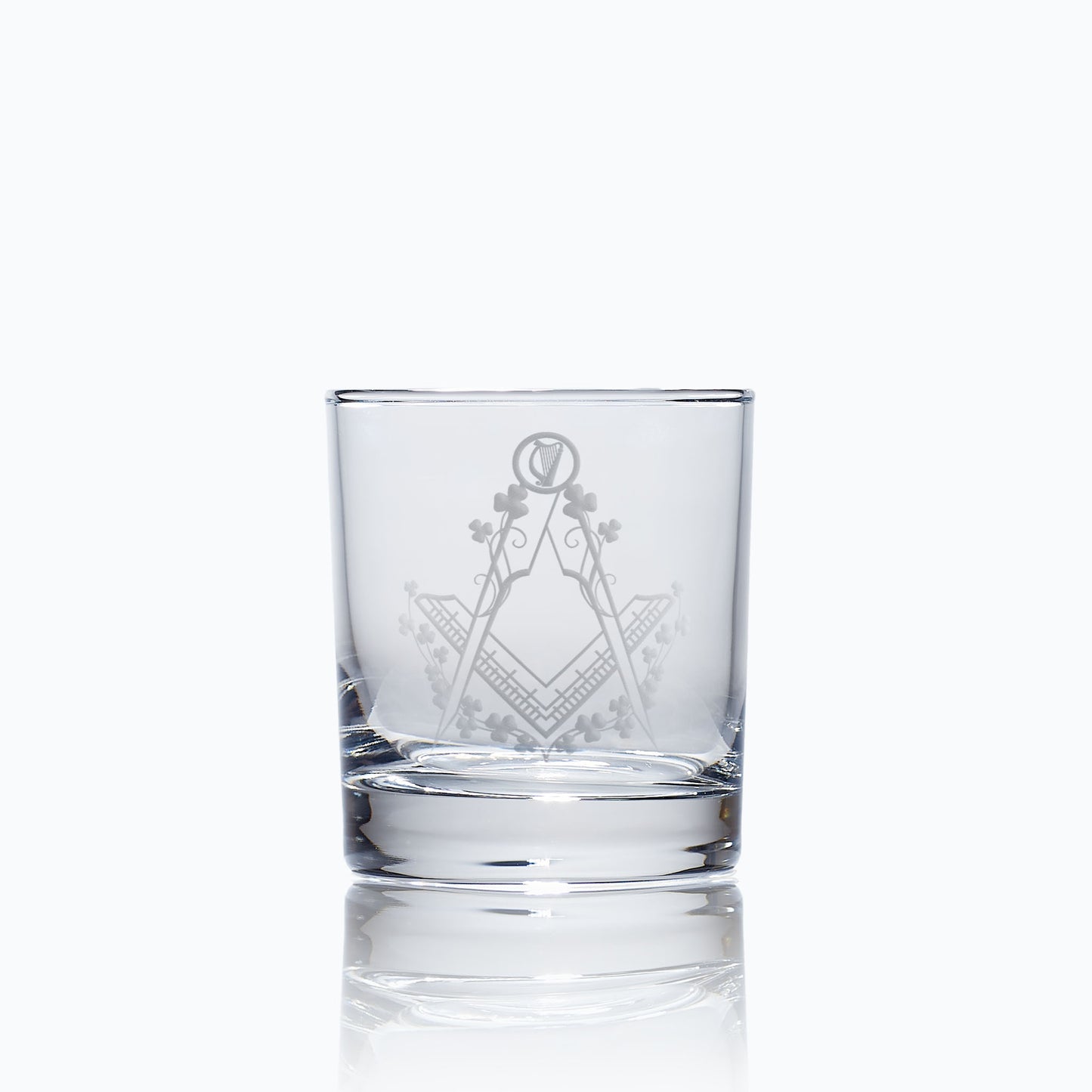 Masonic whiskey tumbler with Irish harp and shamrocks, engraved and photographed on white background