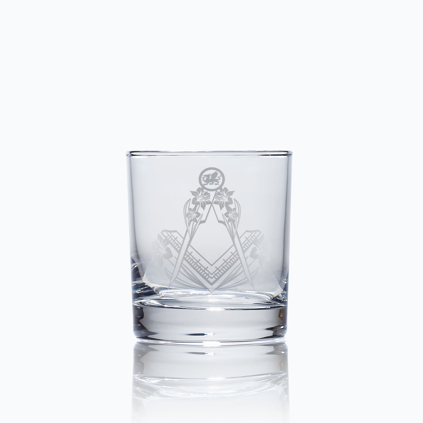 Engraved Masonic glass with Welsh national symbols, photographed on white background