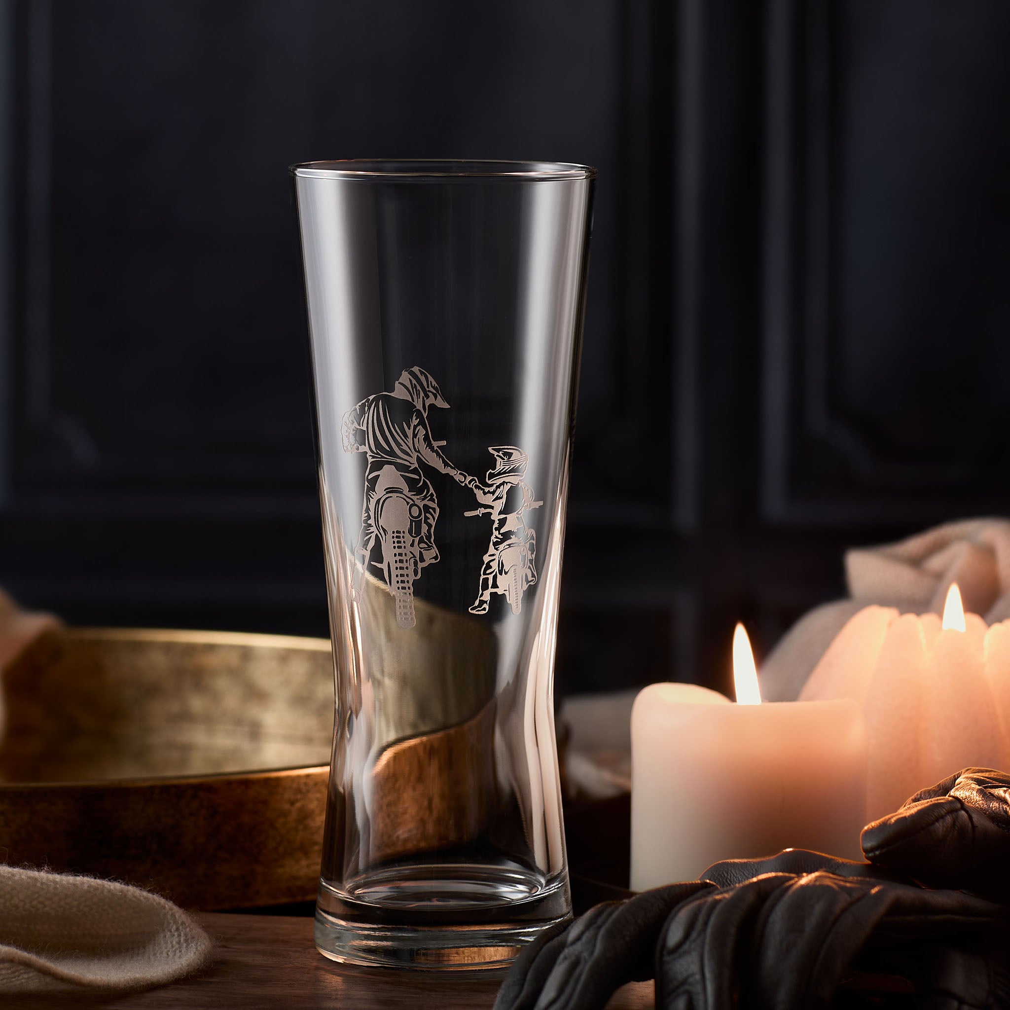 Pilsner pint glass engraved with two off-road motorcycle racing figures