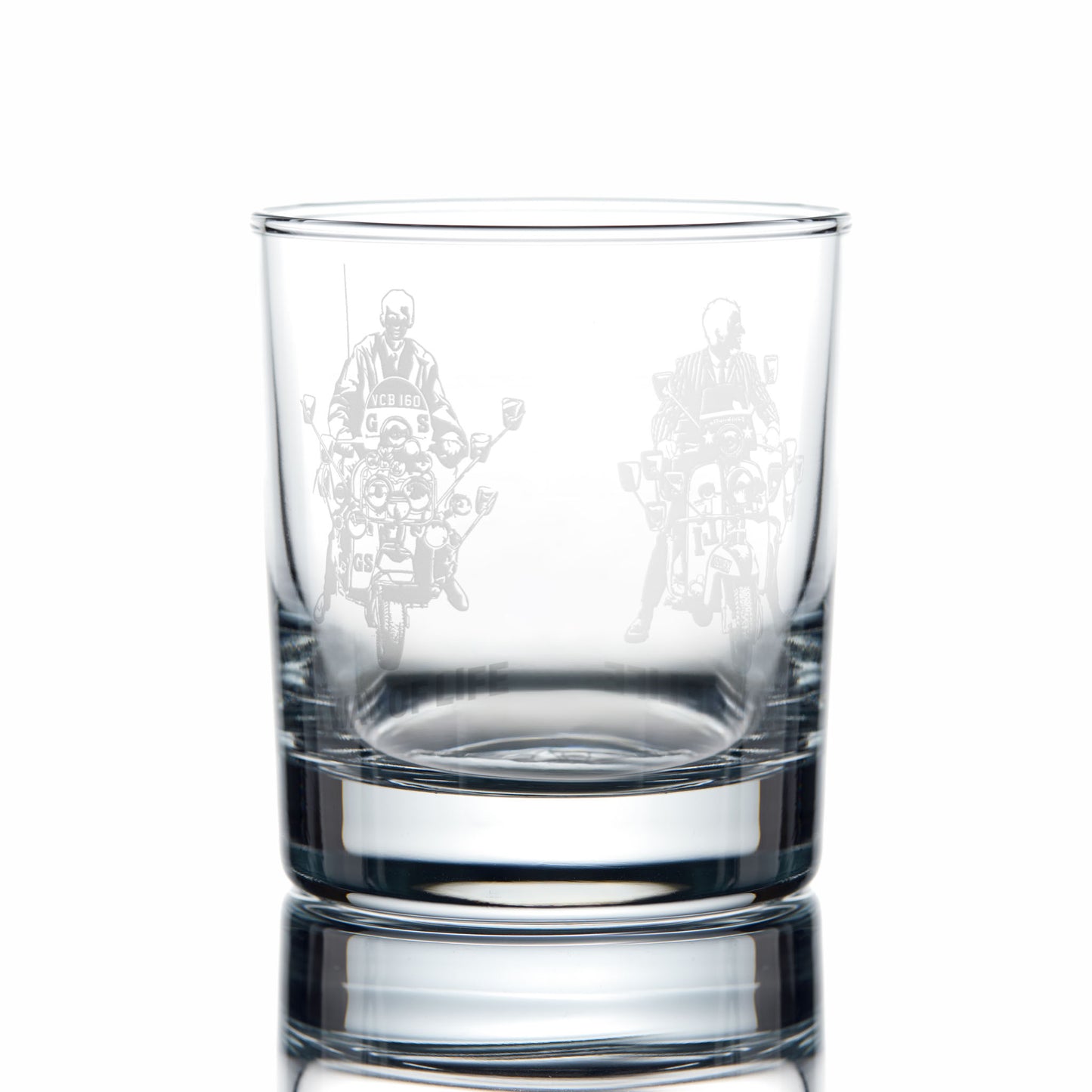 Clear glass whiskey tumbler with engraved scooter design on a white background