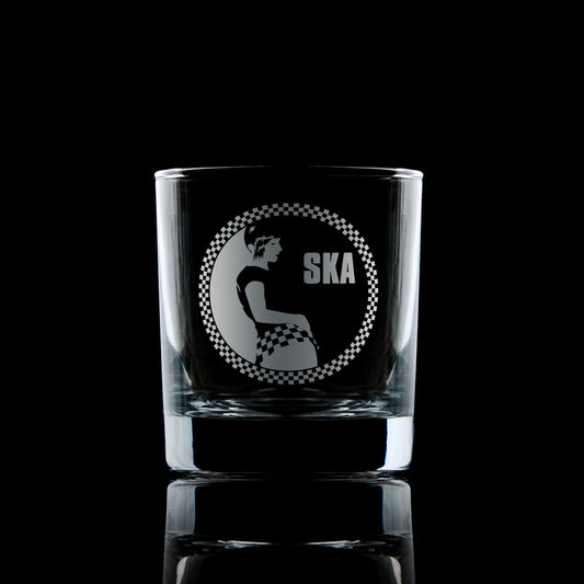 Engraved whisky glass with a Rude Girl in checkerboard skirt and Ska text – circular design with checker border in 2 Tone style