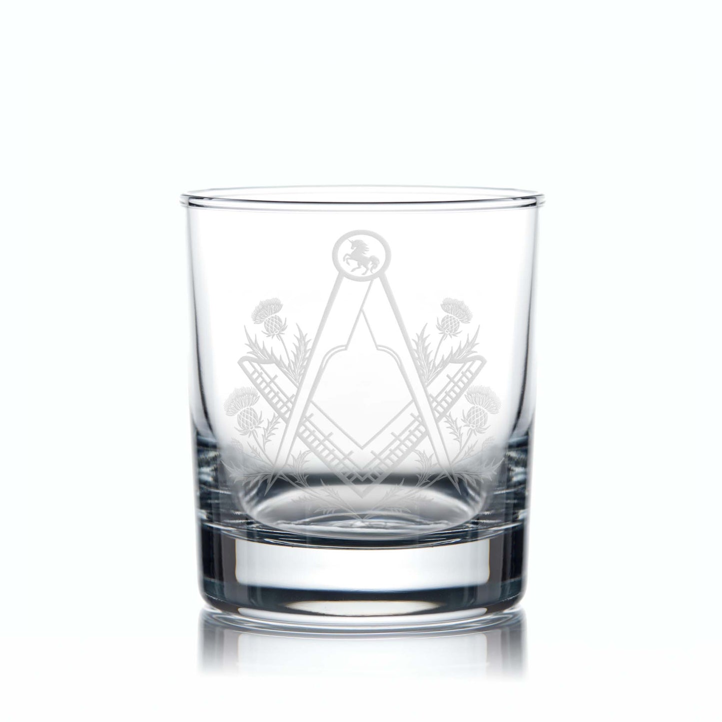 Engraved Masonic whisky glass with Square & Compass, thistles, and Scottish Unicorn, shown on a white background