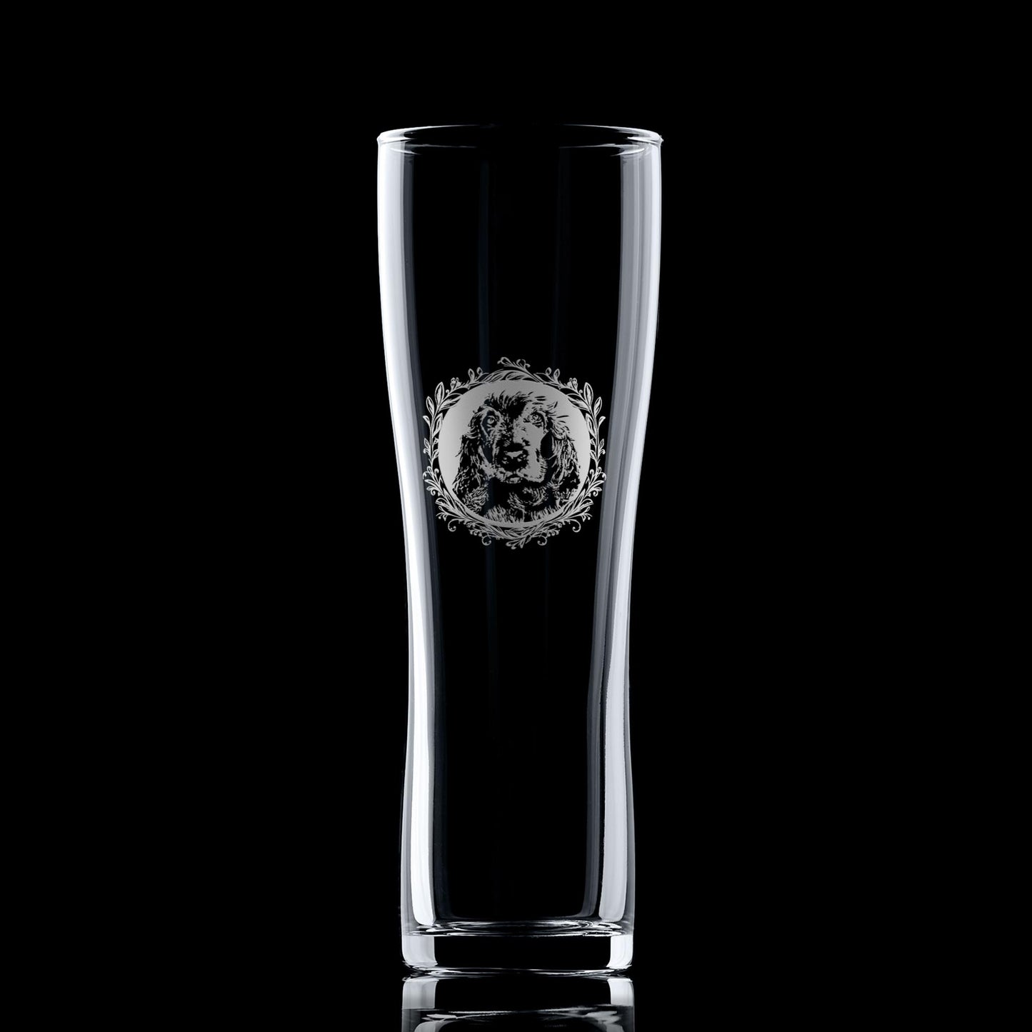 Pint glass with engraved show cocker spaniel portrait in circular frame with leafy garland