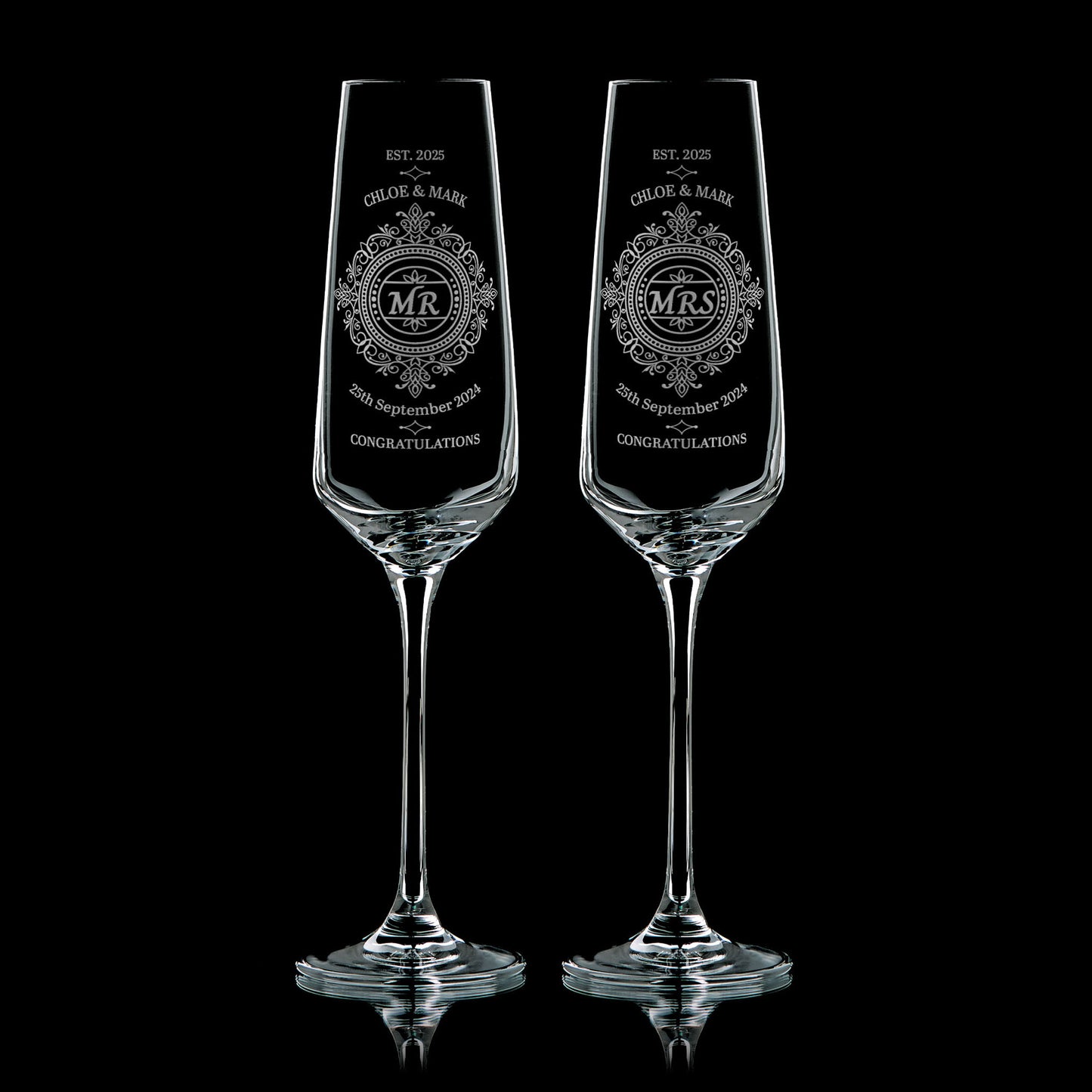 Pair of personalised wedding champagnes flutes, engraved with intricate patterns, Mr and Mrs, the couple names and wedding dates