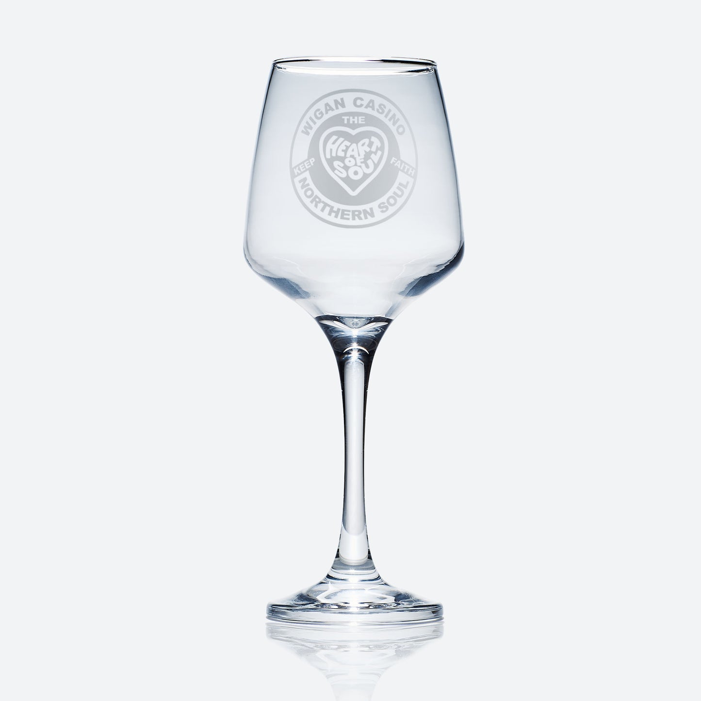 stemmed wine glass engraved with a Wigan Casino badge design