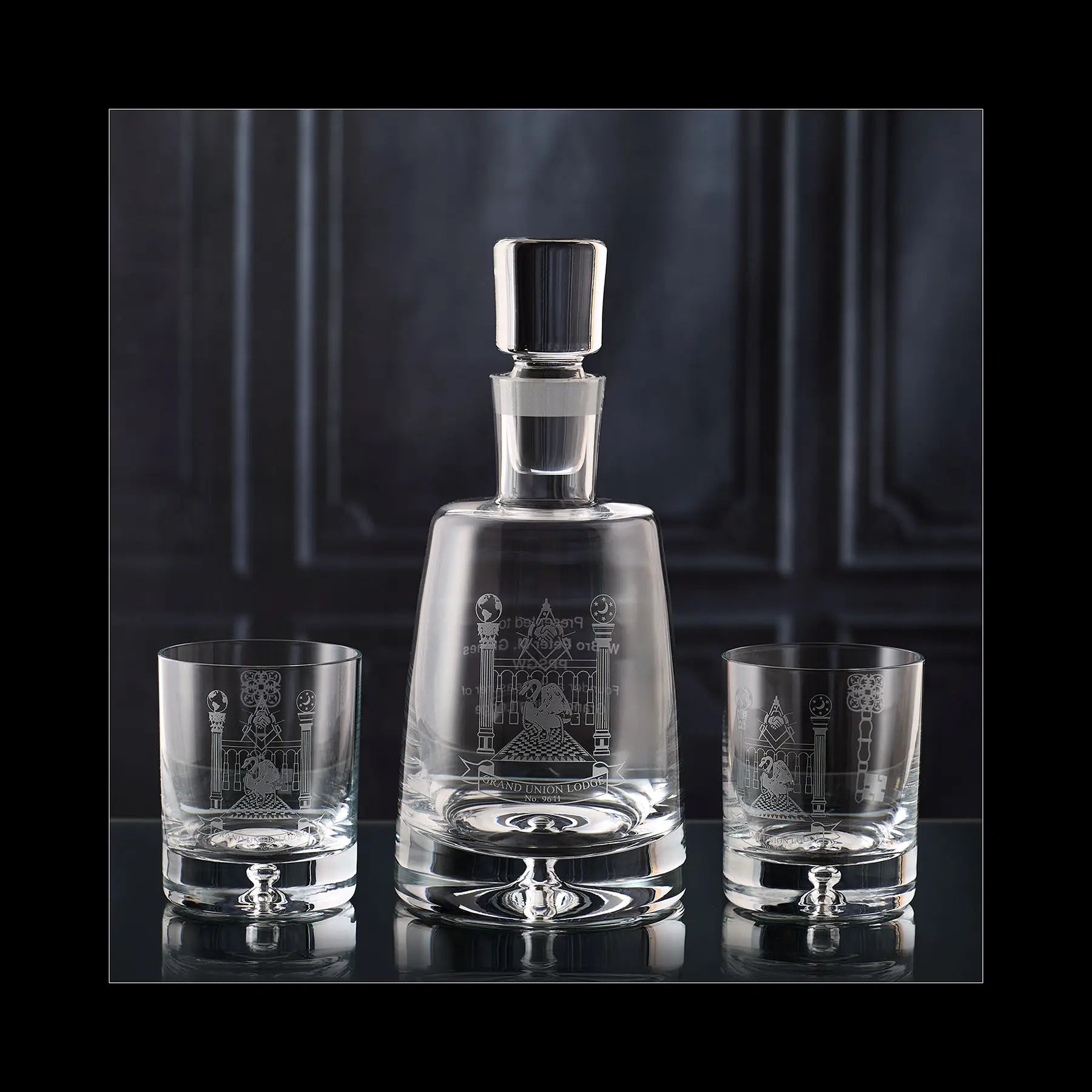 Hand-engraved Grand Union Lodge 9641 decanter and matching glasses with lodge crest and personalised message, prepared for lodge presentation evening.