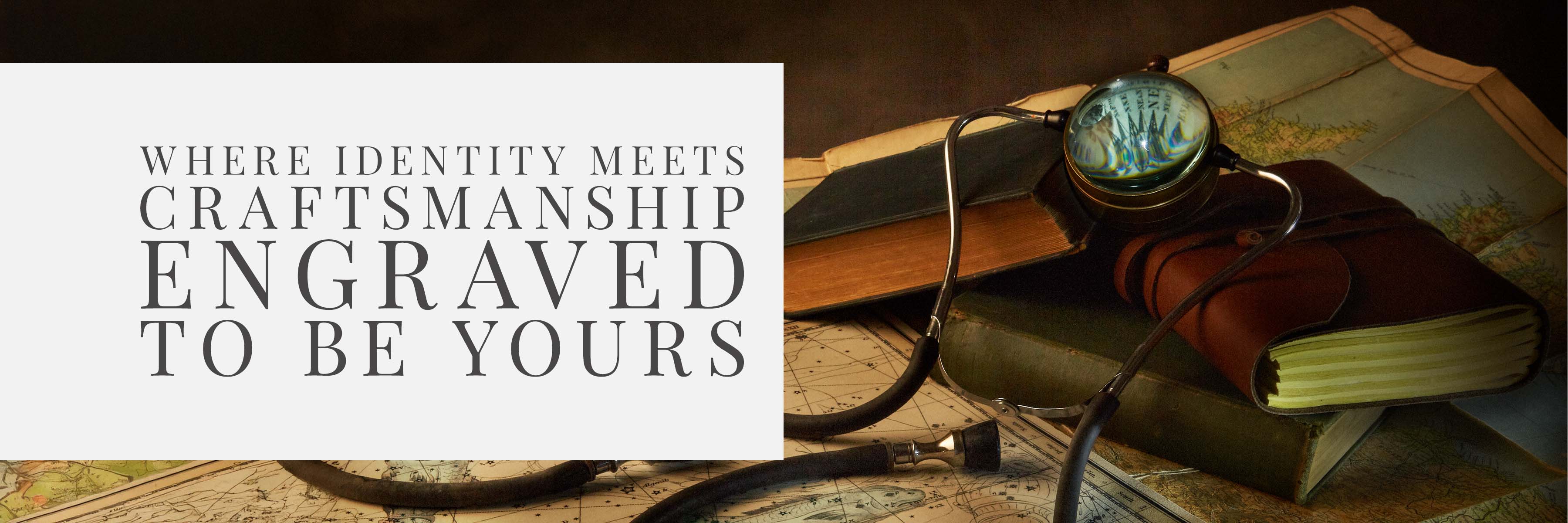 Vintage maps, books, and a glass compass — banner image for The Signature Edit personalised monogrammed glassware collection.