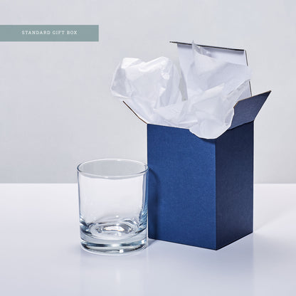 rocks glass and blue tissue lined gift box