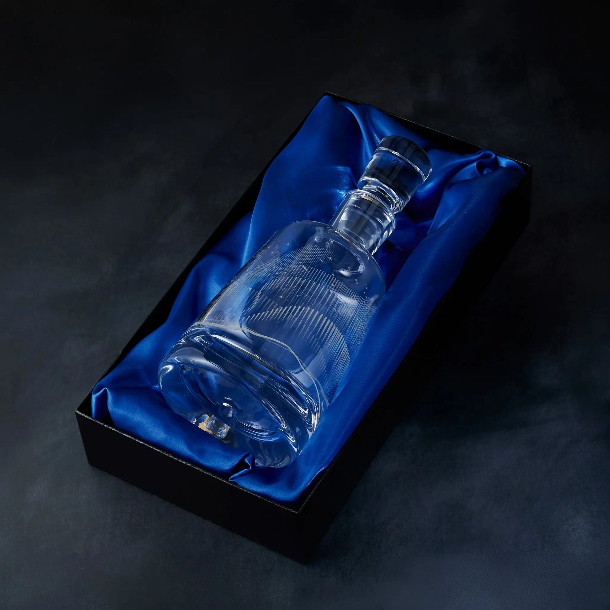 Hand engraved Aurora Borealis decanter with a wrap around Northern Lights design in a satin-lined presentation box