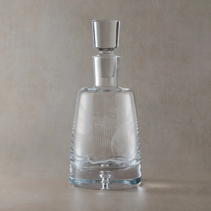 Wraparound Aurora Borealis and stars design engraved on a glass decanter