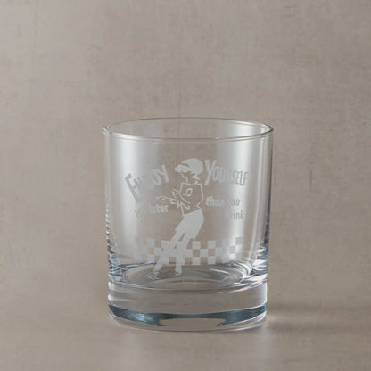 whisky glass engraved with a 2 tone Beat Girl design with Enjoy Yourself text