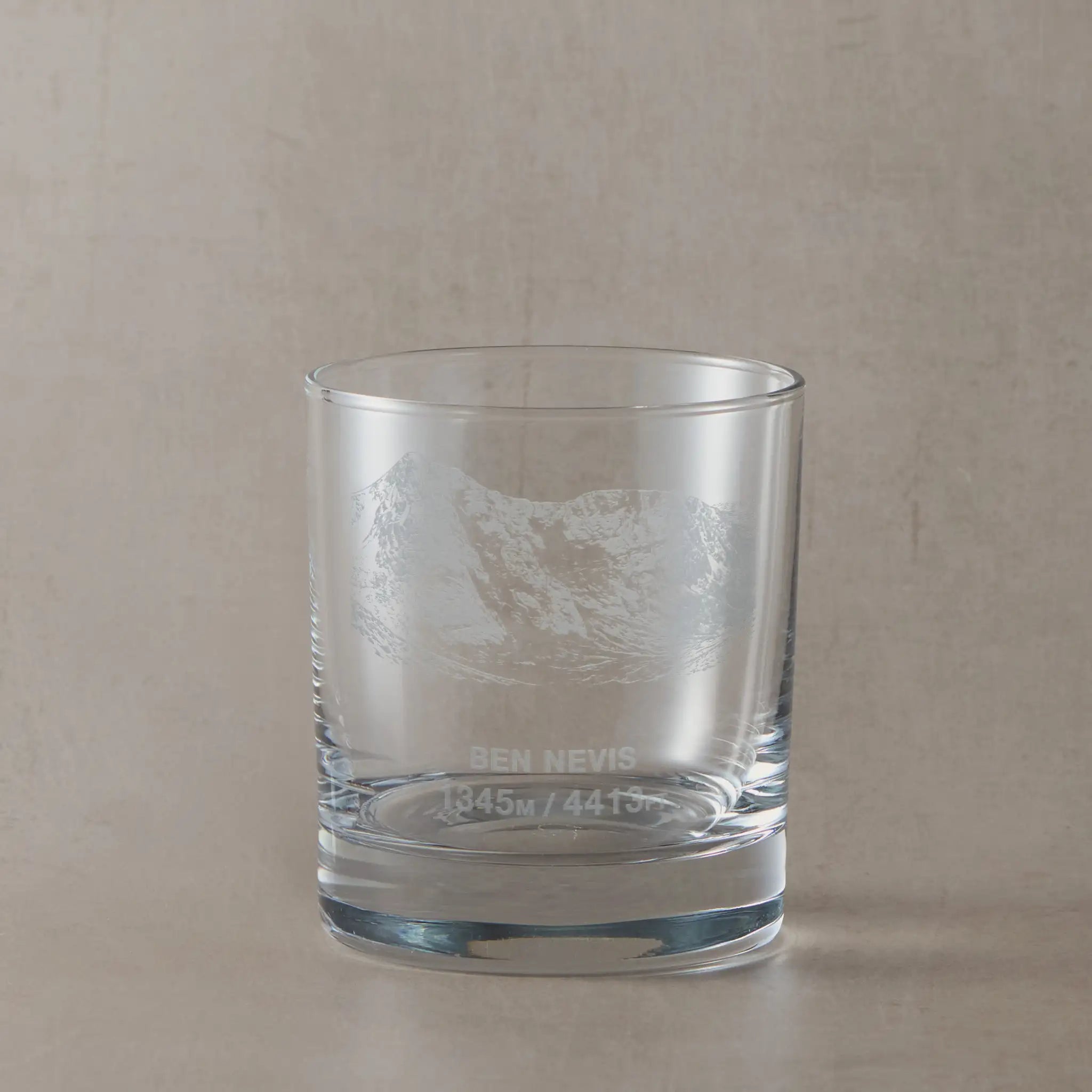 Munro whisky glass engraved with the North East face of Ben Nevis and its height in feet and metres