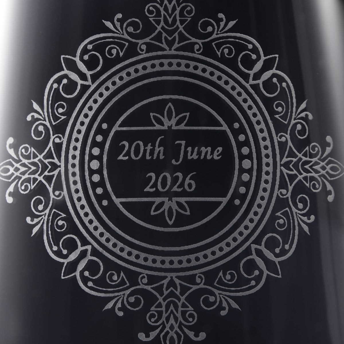 Engraved wedding design with '20th June 2026' and lacework illustration
