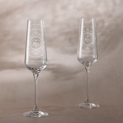 Pair of engraved champagne glasses with Chantilly lace design and ‘Mrs & Mrs’ titles