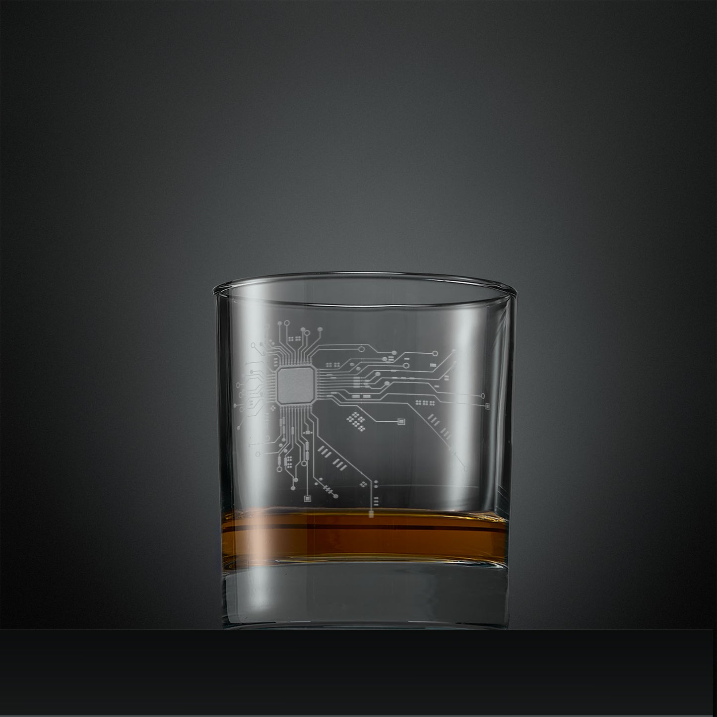 Engraved whisky glass with circuit board design
