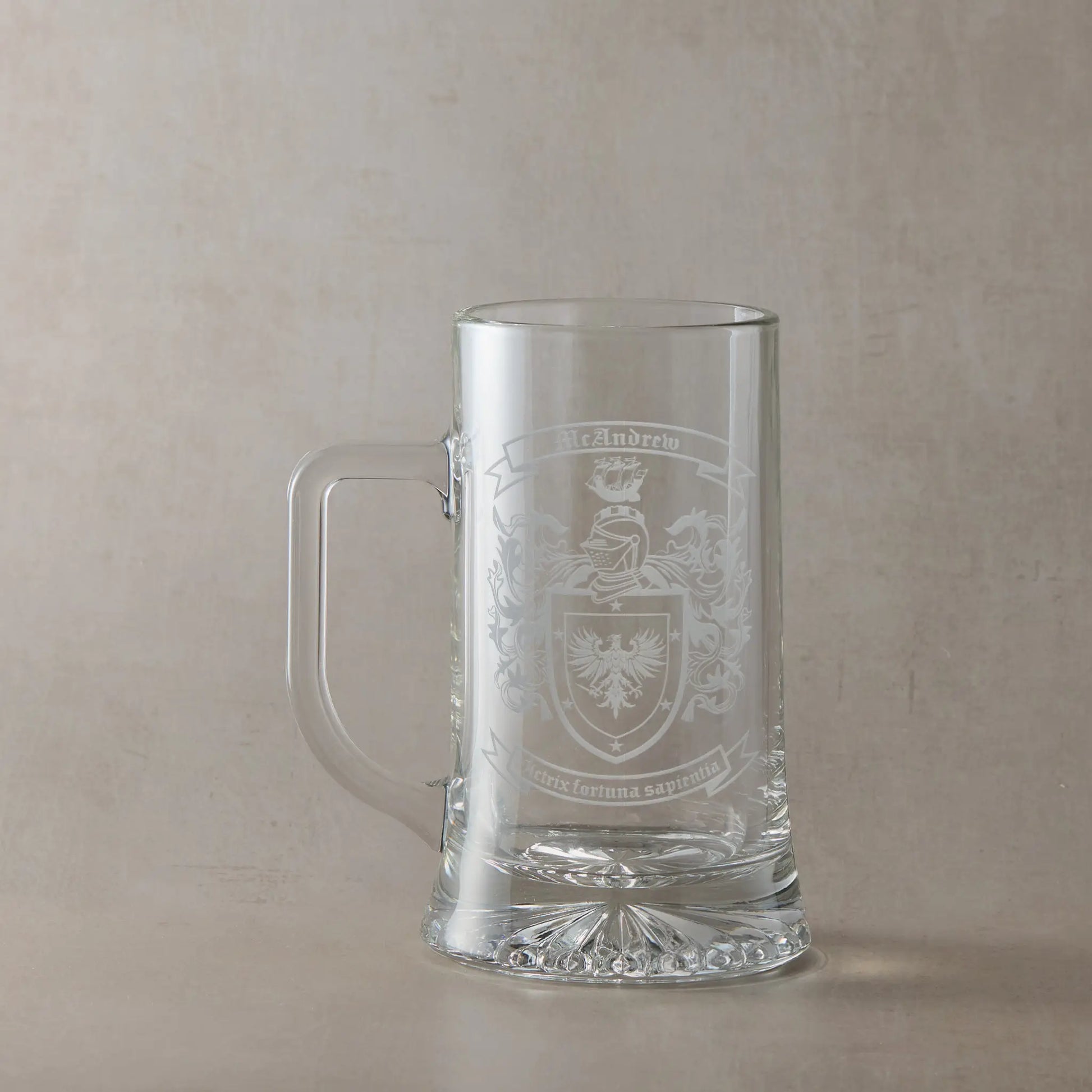 Heraldic tankard engraved with coat of arms, shield, family name, motto and mantle