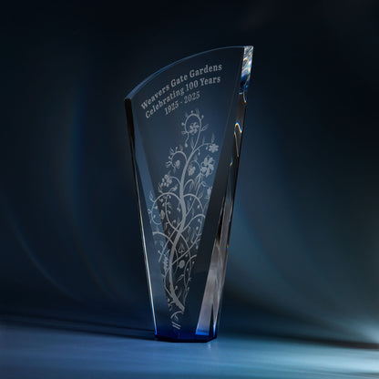 Engraved optical crystal shard award with sapphire blue base and corporate logo
