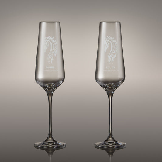 Pair of engraved champagne flutes with corporate logo