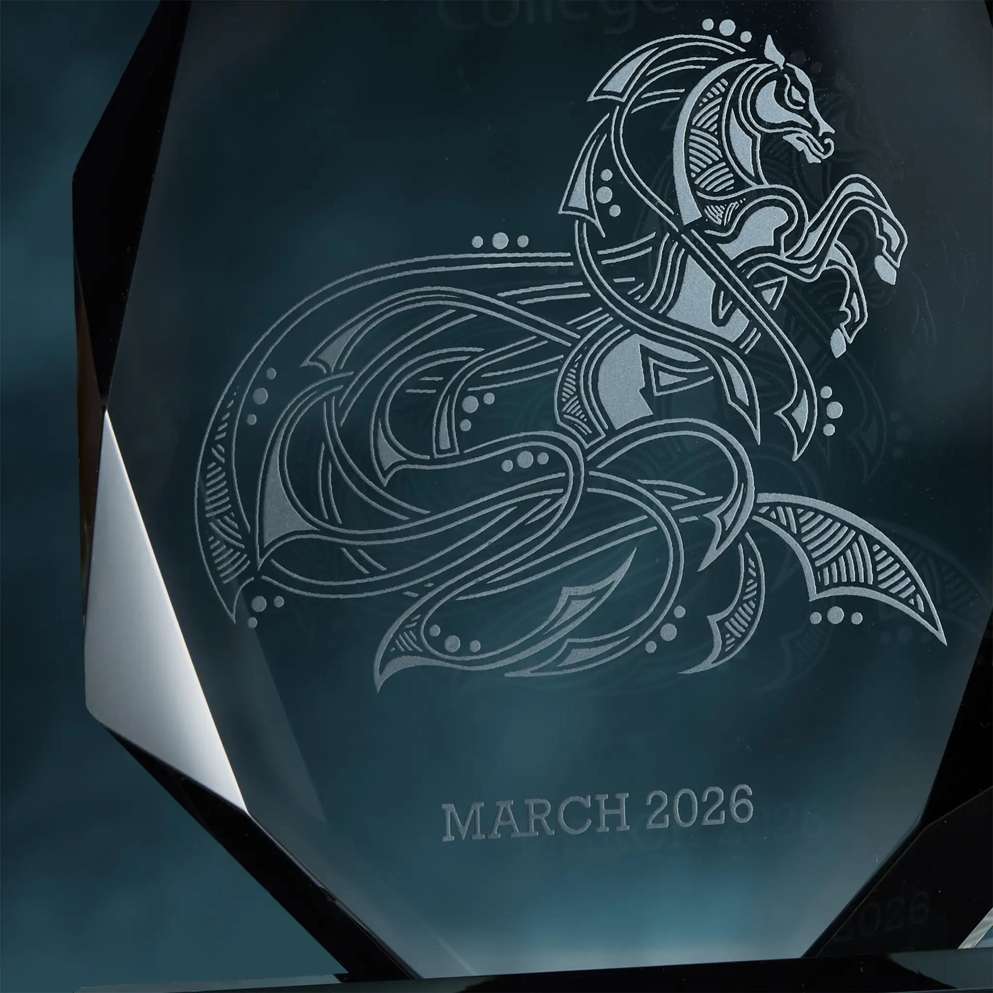 Decorative award with an engraved horse emblem and 'MARCH 2026' text on a dark background