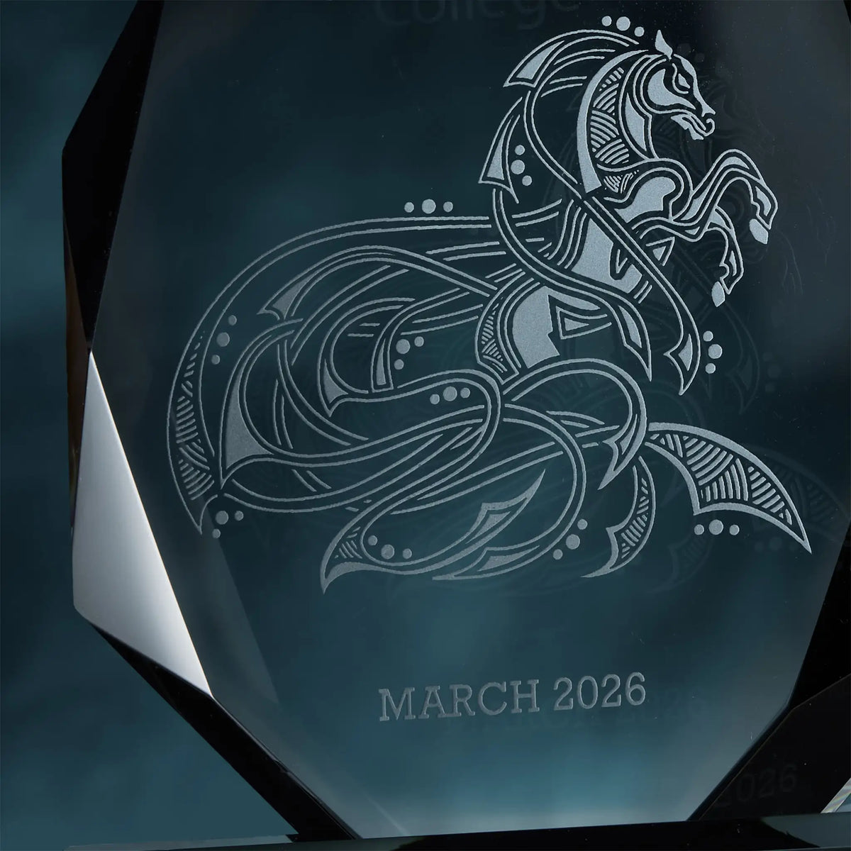 Decorative award with an engraved horse emblem and 'MARCH 2026' text on a dark background