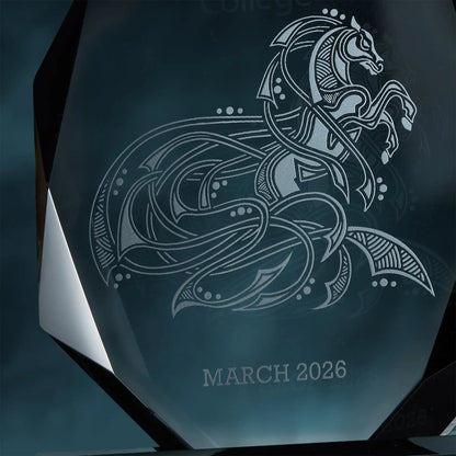 Decorative award with an engraved horse emblem and 'MARCH 2026' text on a dark background