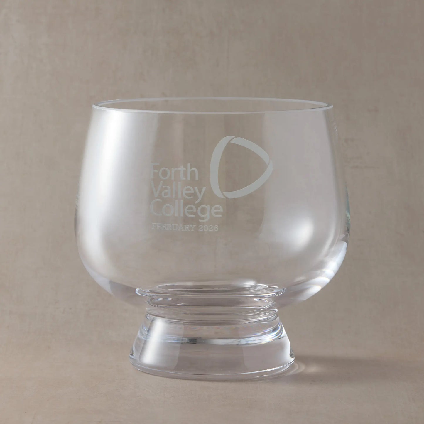 Engraved presentation bowl featuring a corporate logo, for awards, milestones, and professional gifting.