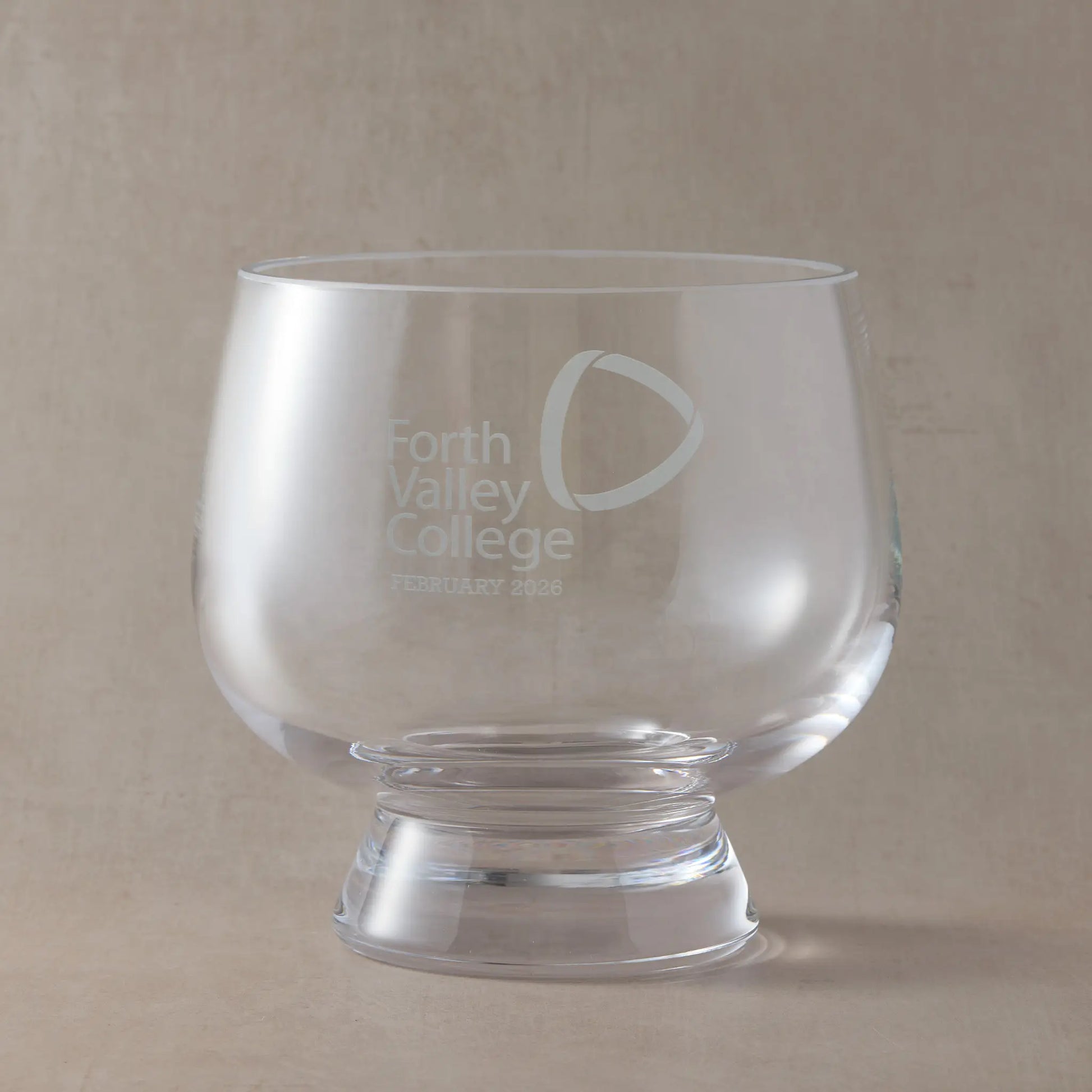 Engraved presentation bowl featuring a corporate logo, for awards, milestones, and professional gifting.
