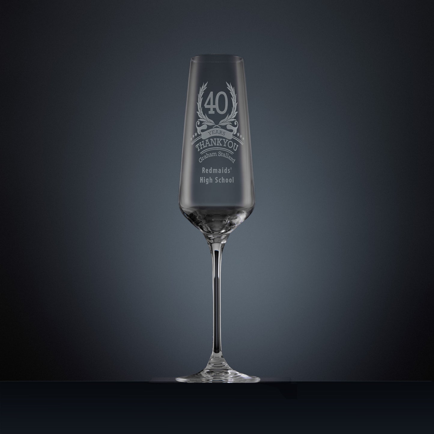 Engraved champagne flute with laurel wreath design and years of service thank you message
