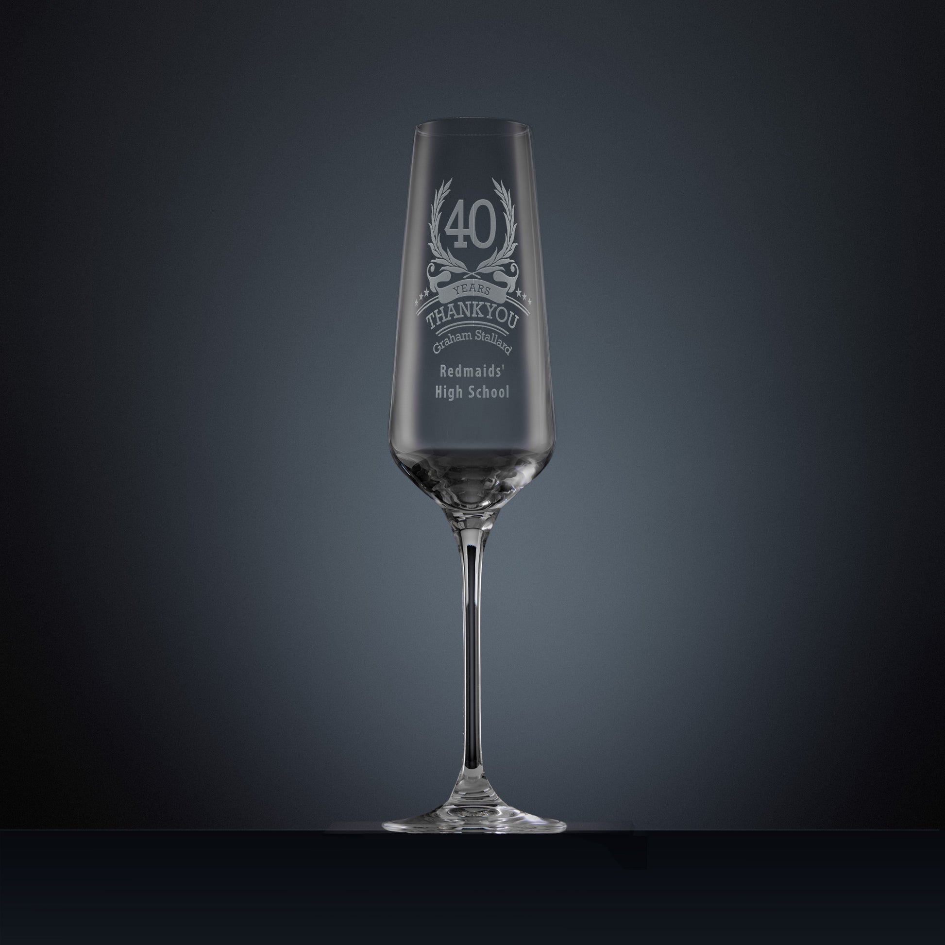 Engraved champagne flute with laurel wreath design and years of service thank you message