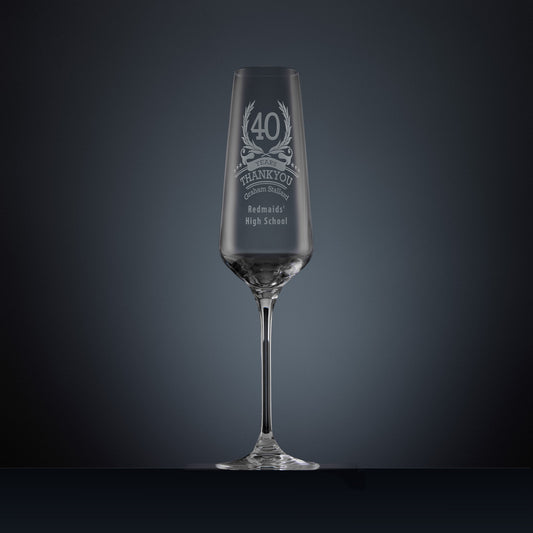 Engraved champagne flute with laurel wreath design and years of service thank you message