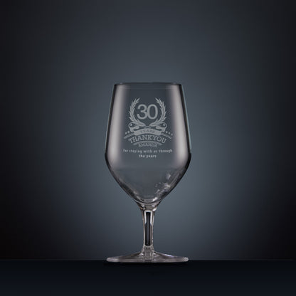 Engraved mineral water glass with laurel wreath design and years of service thank you message