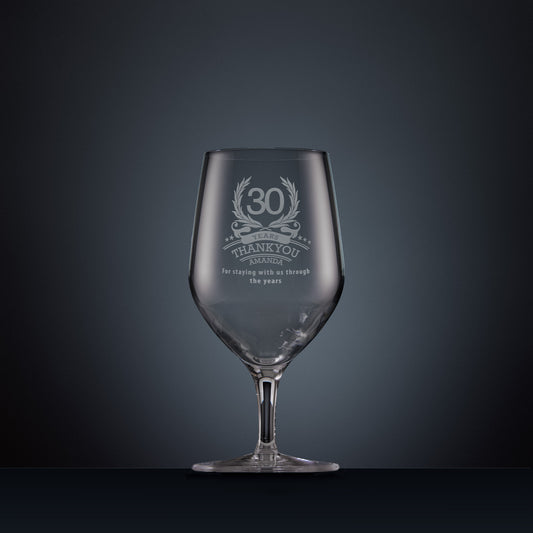 Engraved mineral water glass with laurel wreath design and years of service thank you message
