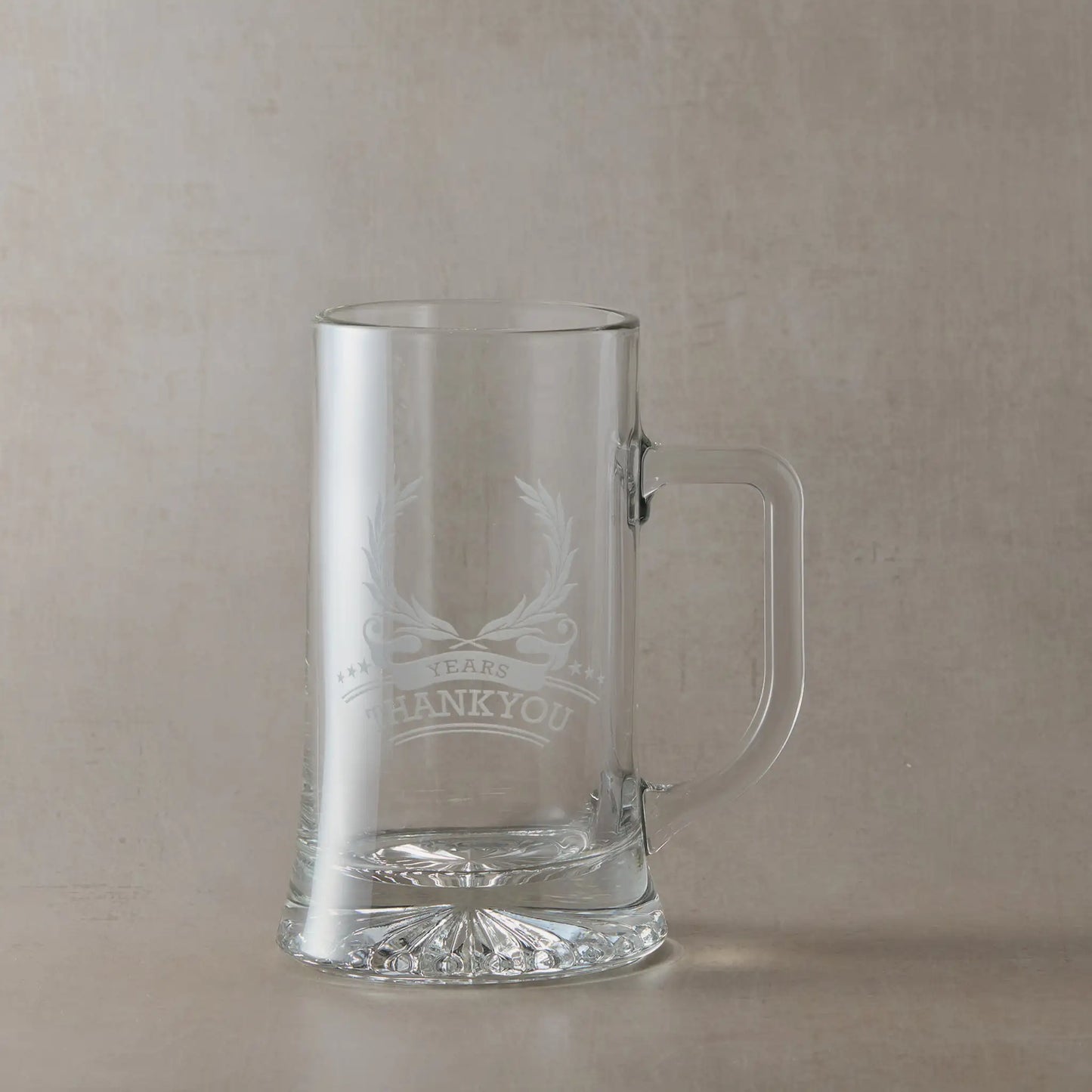 Tankard engraved for years of service appreciation, featuring wreath, stars, and curved text