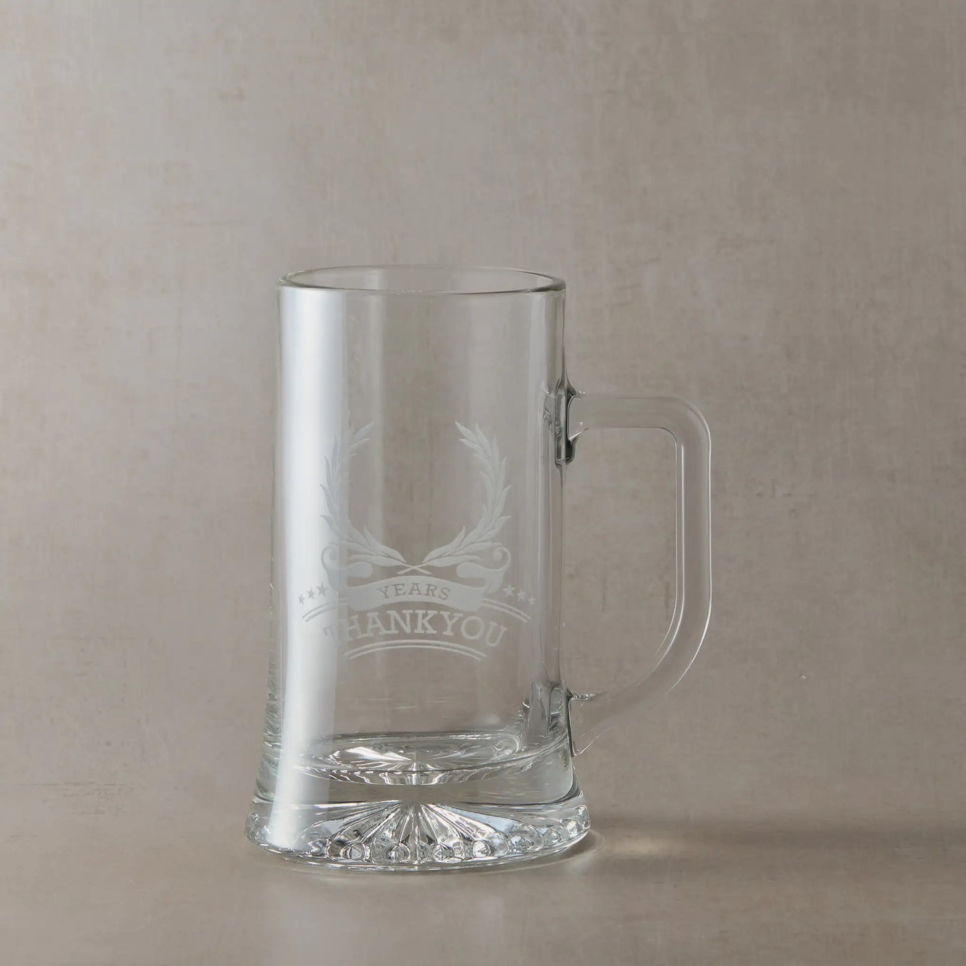 Tankard engraved for years of service appreciation, featuring wreath, stars, and curved text