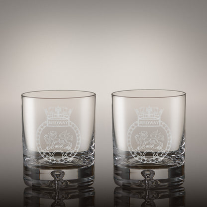 Pair of engraved whisky glasses with matching corporate logos