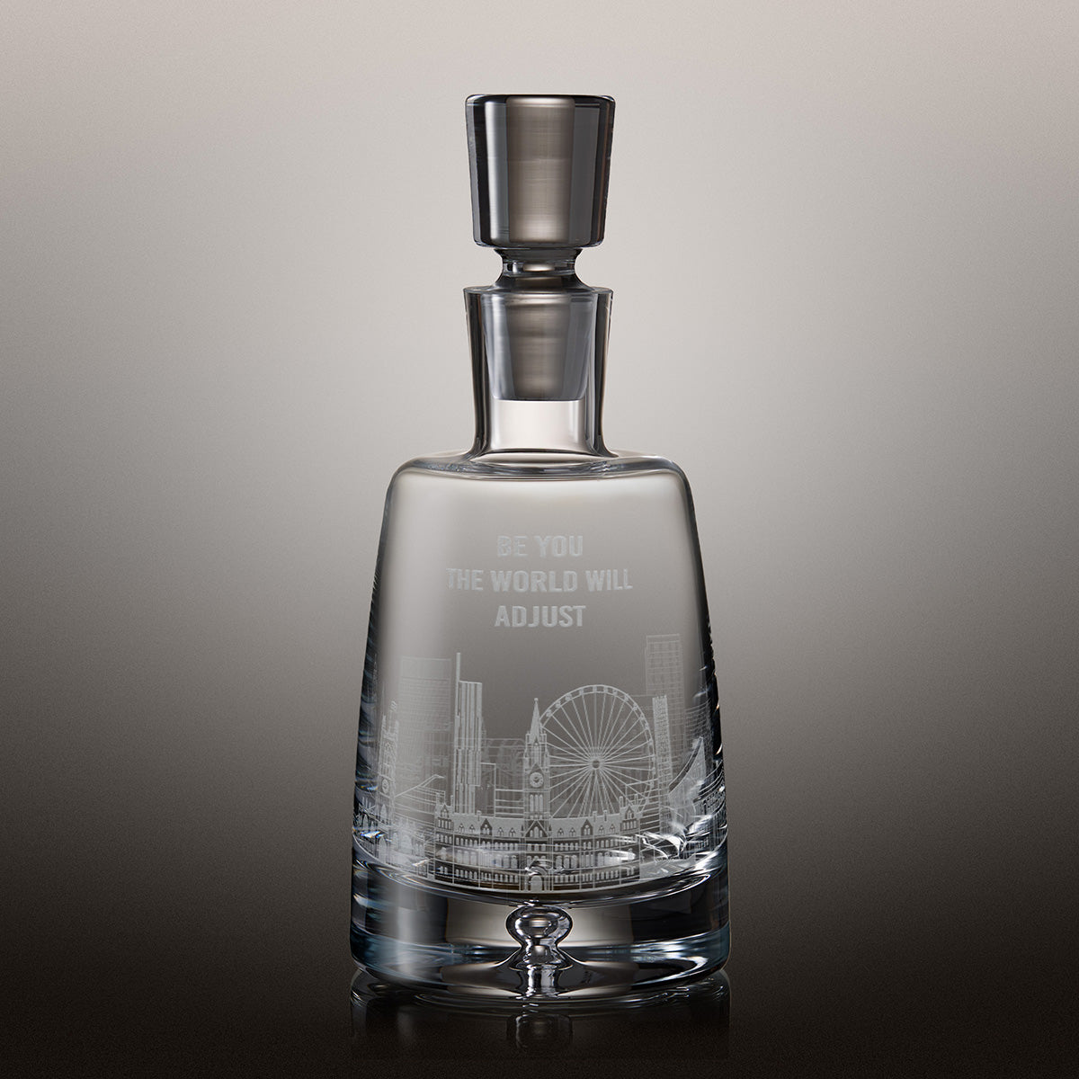 Engraved decanter with an illustration of a city skyline and personalised inscription
