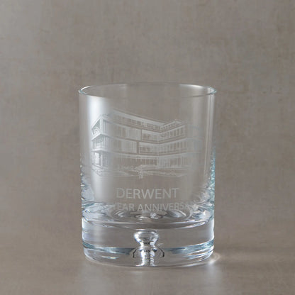 Custom engraved whisky glass branded with corporate logo and text