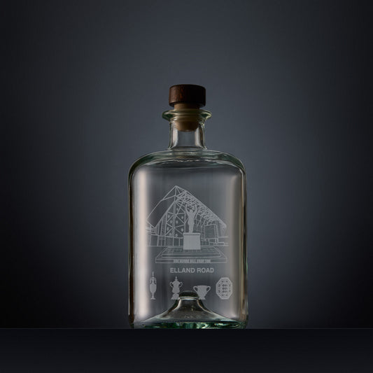 Engraved apothecary-style decanter with Elland Road stadium illustration