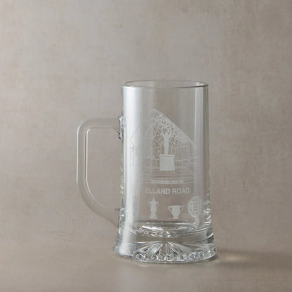 Leeds Clear glass tankard with engraved Elland Road design on a beige background