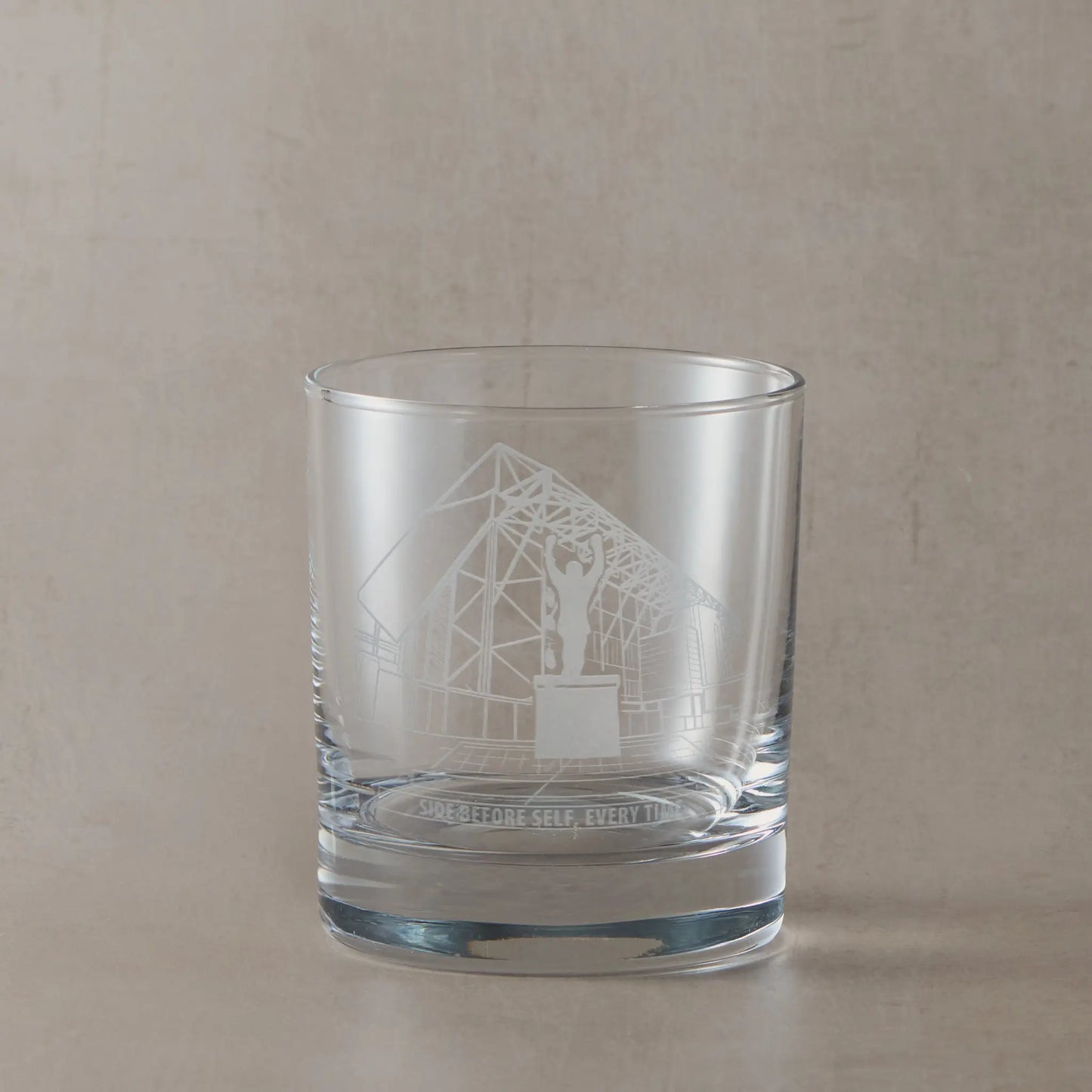 Engraved whisky glass line-art design of Elland Road stadium façade with space beneath for your own message