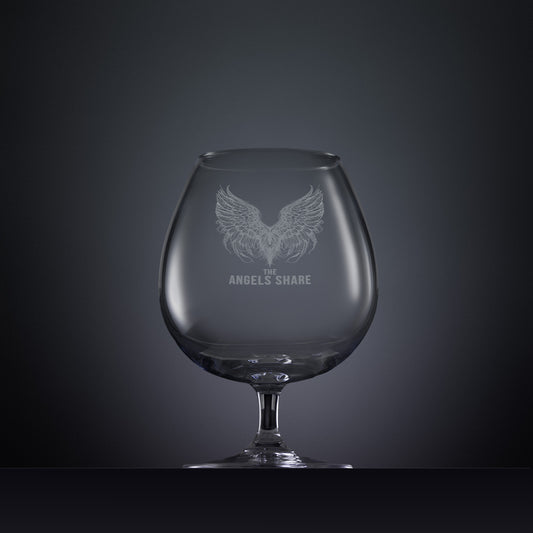 Engraved brandy glass with an  illustration of feathered wings and The Angels Share text