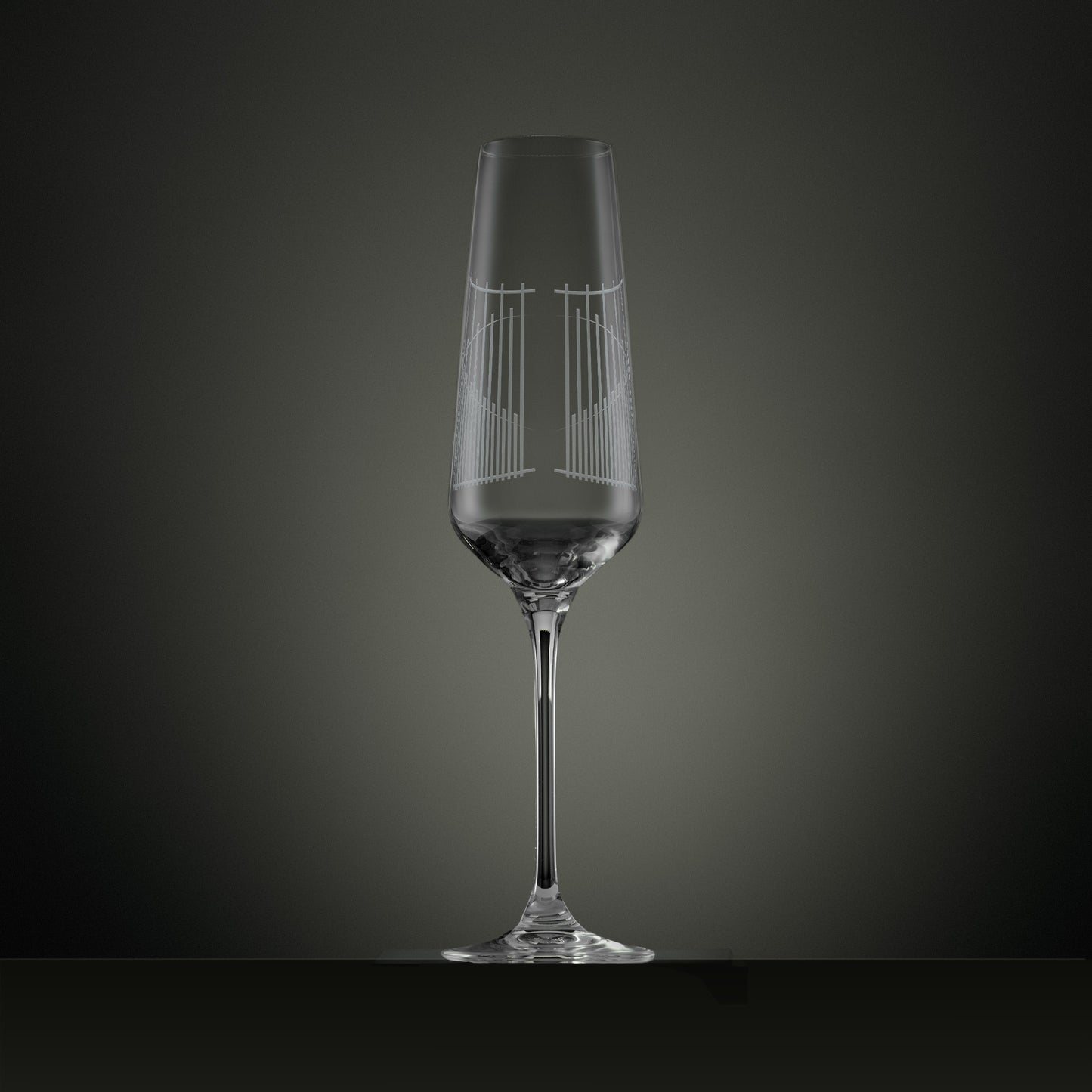Engraved champagne flute showing the back detail of an illustration of the Ascot gates